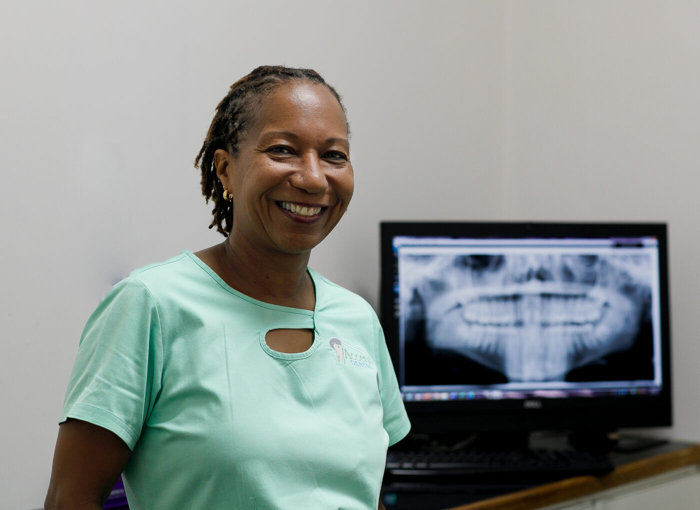 Dr. Joanne Gilbert at Accent Dental with dental X-ray